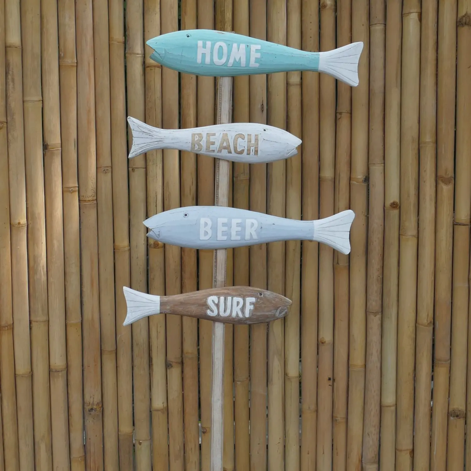  Product image 2 of the product “Stick with 4 colorful  direction signs in shape of fish with the words; Home, Beach, Beer and Surf. Made from wood, total height 150cm. ”